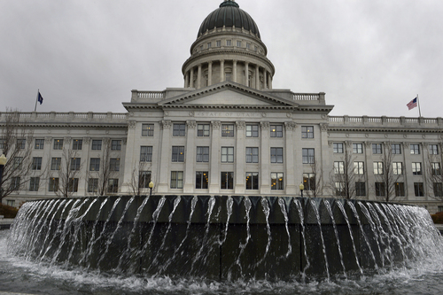 Scott Sommerdorf   |  The Salt Lake Tribune
An approaching storm blows the waters in the Capitol fountain sideways, Wednesday, Feb. 19, 2014.