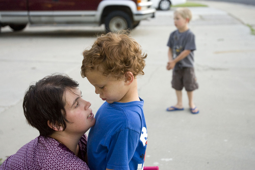 Kim Raff  |  The Salt Lake Tribune
Angie Watterson talks her son, James Turner, through an argument with his friend over what game to play, "sonic" or "zombies." Turner is one of 300 children to win coveted spots in Utah's autism treatment "lottery."