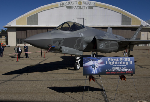 Rick Egan  |  The Salt Lake Tribune
Dignitaries and workers at Hill Air Force base get their first look at the the F-35A Joint Strike Fighter on Friday. The F-35A is a multi-variant, multi-role 5th Generation Fighter, and will undergo organic depot modification work at Hill AFB.