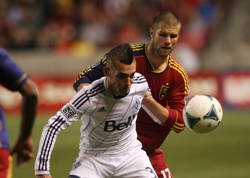Kim Raff  |  The Salt Lake Tribune
(left) Vancouver Whitecaps FC midfielder Russell Teibert (31) and (right) Real Salt Lake defender Chris Wingert (17) compete for a ball in the air during a match at Rio Tinto Stadium in Sandy on May 4, 2013.  Real Salt Lake went on to win the game 2-0.