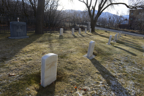 Scott Sommerdorf   |  The Salt Lake Tribune
Scott Porter is making a film about German WWII POWs held in Utah. These headstones mark where some of the German soldiers are buried at Fort Douglas, Friday, Feb. 28, 2014.