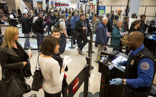 Lennie Mahler  |  The Salt Lake Tribune
Travelers pass through the expedited security line in Salt Lake City International Airport, Tuesday, March 4, 2014. Enrollment in the new TSA Pre-Check program grants passengers an ID number for $85 that allows access to the expedited security line for five years.