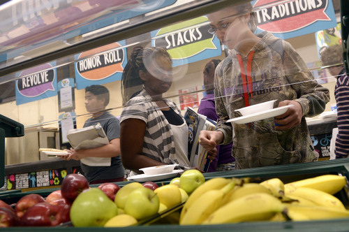 Al Hartmann  |  The Salt Lake Tribune 
Students at Granite Park Middle School in Salt Lake City choose fresh fruit as part of their breakfast on Tuesday for National School Breakfast Week.  All students participated in the healthy school breakfast organized by "Fuel Up for 60."