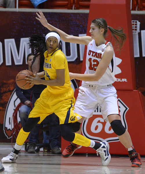 Scott Sommerdorf   |  The Salt Lake Tribune
Cal's Courtney Range is defended by Utah's Emily Potter during first half play. The Utah women lost to California 68-59, Sunday, January 12, 2014.