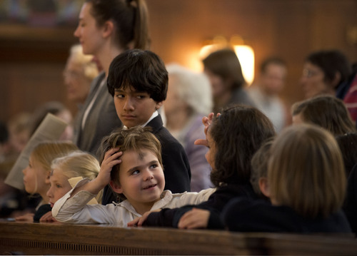 Lennie Mahler  |  The Salt Lake Tribune
Children participate in the Ash Wednesday ceremony marking the beginning of Lent at the Cathedral of the Madeleine, March 5, 2014, in Salt Lake City.
