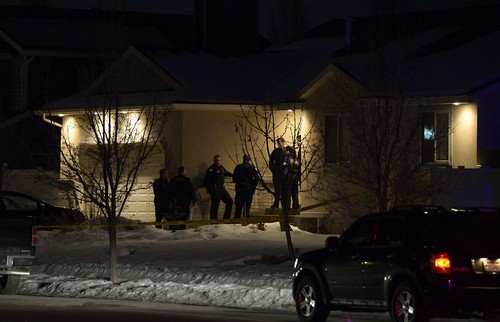 Leah Hogsten  |  The Salt Lake Tribune
Syracuse Police officers investigate the scene where three people died in a shooting in Syracuse at 2133 W. 1175 South, Tuesday, January 14, 2014.
