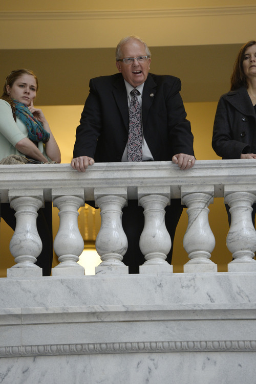 Francisco Kjolseth  |  The Salt Lake Tribune
Representative Mike Noel, R-Kanab, watches from above as supporters of SB100 that would prohibit discrimination based on sexual orientation rally at the Utah State Capitol  on Wednesday, March 5, 2014. Though polls indicate a majority of Utahns support the idea, legislative leaders have said they won't hear any bills related to lesbian, gay, bisexual and transgender issues this year, including other proposals less friendly to the LGBT community as the state defends its ban on gay marriage in court.