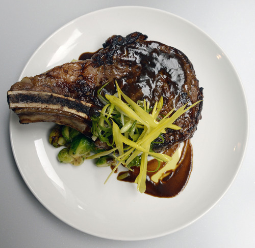 Al Hartmann  |  The Salt Lake Tribune 
T-bone steak with brussel sprouts at Bistro 222.