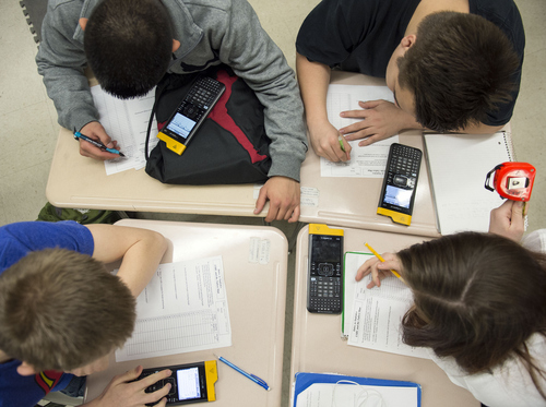 Keith Johnson | The Salt Lake Tribune

Students in Rob Lake's introduction to statics class use their Texas Instruments wireless calculators  at Kearns High School, February 5, 2014 in Kearns, Utah. Each student has a calculator that transmits its data onto a screen for all to see. The Utah Legislature is looking into infusing millions of dollars for technology in Utah classrooms. Kearns High received a $1 million grant 3 years ago, allowing every student to get an iPod touch to help in the classroom. The results were mixed.