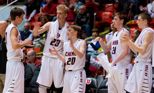 Trent Nelson  |  The Salt Lake Tribune
American Fork players celebrate the win as time runs out, as Brighton faces American Fork High School in the 5A state boys basketball tournament at the Huntsman Center in Salt Lake City, Thursday, March 6, 2014.