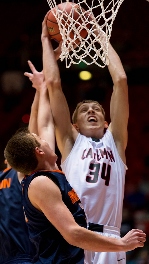 Trent Nelson  |  The Salt Lake Tribune
American Fork's Taylor Rawson goes up for a rebound as Brighton faces American Fork High School in the 5A state boys basketball tournament at the Huntsman Center in Salt Lake City, Thursday, March 6, 2014.
