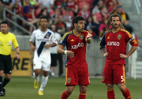 Kim Raff  |  The Salt Lake Tribune
(left) Real Salt Lake midfielder Javier Morales (11) talks to (right) Real Salt Lake midfielder Kyle Beckerman (5) and other teammates after a second goal was scored by the Los Angeles Galaxy in the first 13 minutes of the game at Rio Tinto in Sandy on April 27, 2013. Real Salt Lake lost the game 2-0.