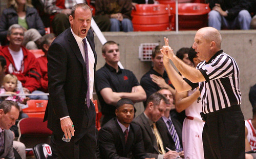 Leah Hogsten  |  The Salt Lake Tribune
Utah Utes head coach Larry Krystkowiak disagrees with a call during the second half. University of Utah defeated Evergreen State 128-44 Friday, November 8, 2013 at the Huntsman Center.