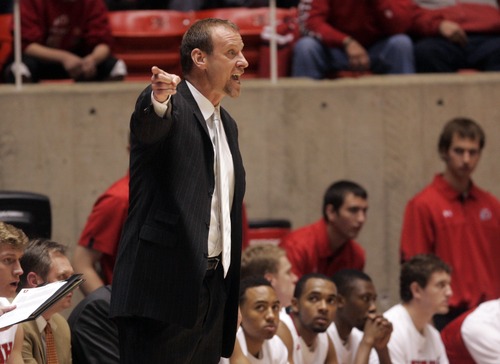 Kim Raff  |  The Salt Lake Tribune
University of Utah head coach Larry Krystkowiak yells at his players from the sidelines against Sacramento State during a men's basketball game at the Huntsman Center in Salt Lake City on November 16, 2012. They went on to lose the game 71-74.