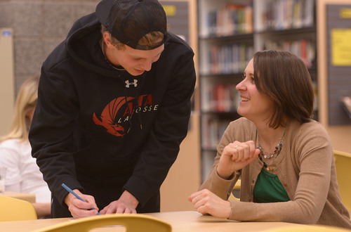 Leah Hogsten  |  The Salt Lake Tribune
Alta High School english teacher Shelly Karren talks with student Steven Boyce, one of a few males to attend the women's conference. 
Alta High students kicked off the inaugural Women in Action club leadership seminar Saturday, March 8, 2014, a pilot program connected to Rutgers University's "Women in Politics" leadership program.