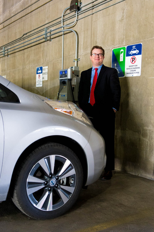 Trent Nelson  |  The Salt Lake Tribune
Associate Deputy Mayor Justin Miller with his electric-powered Nissan Leaf and the electric vehicle charging station at the Salt Lake County Government Center, in Salt Lake City, Friday, March 7, 2014.