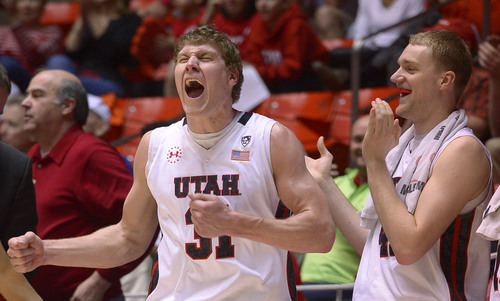 Leah Hogsten  |  The Salt Lake Tribune
Utah Utes center Dallin Bachynski (31) and the team celebrate Utah Utes forward Renan Lenz (10) play. University of Utah defeated Arizona State 86-63 Sunday, February 23, 2014, at the Jon M. Huntsman Center.