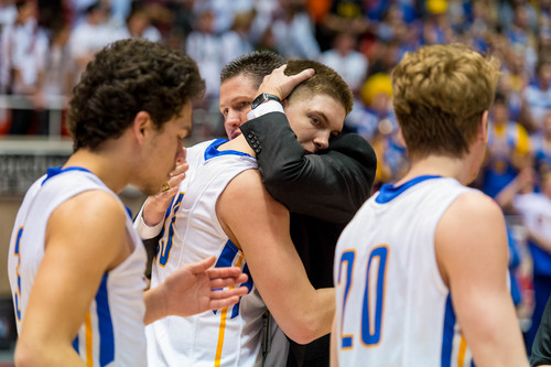 Trent Nelson  |  The Salt Lake Tribune
UHSAA Executive Director Rob Cuff embraces Orem's Dalton Nixon after the loss, as Bountiful faces Orem High School in the 4A state championship boys basketball game at the Huntsman Center in Salt Lake City, Saturday, March 8, 2014.