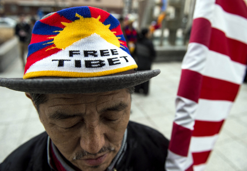 Keith Johnson | The Salt Lake Tribune

Tashi Porong joins a  small crowd of pro-Tibet demonstrators outside the Wallace F. Bennett Federal building in Salt Lake City, March 10, 2014.