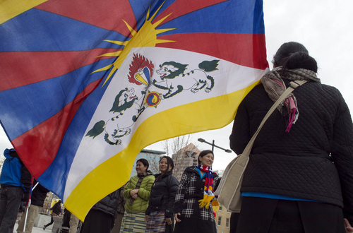 Keith Johnson | The Salt Lake Tribune

A small crowd of pro-Tibet demonstrators gather outside the Wallace F. Bennett Federal building in Salt Lake City, March 10, 2014.