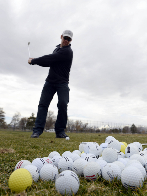 Francisco Kjolseth | The Salt Lake Tribune

Tyson Miller tries to will Spring to arrive by hitting a bucket of balls at the Mountain View golf course in West Jordan, Utah, March 10, 2014.
