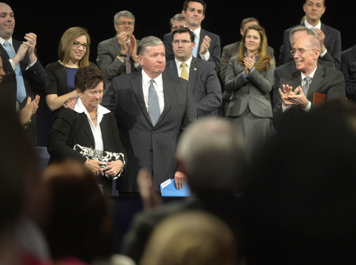 Keith Johnson | The Salt Lake Tribune

Outgoing BYU President Cecil O. Samuelson and  his wife Sharon get a standing ovation from Henry Eyring of the First Presidency of The Church of Jesus Christ of Latter-day Saints, right, and the crowd gathered at the Marriott Center in Provo, Utah, following a devotional, March 11, 2014. Kevin J. Worthen J.D., former dean of the J. Reuben Clark Law School and current advancement vice president of Brigham Young University, will be the 13th president of BYU. Worthen will begin his tenure as president on May 1, 2014. Worthen replaces Cecil Samuelson.