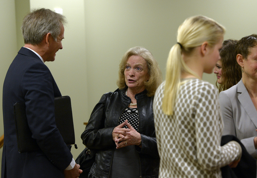Scott Sommerdorf   |  The Salt Lake Tribune
Gayle Ruzicka of the Eagle Forum, speaks with Ed Smart, left, after his daughter, Elizabeth Smart spoke about HB286 - Child Sexual Abuse Prevention - as it was heard in committee, Wednesday, Feb. 19, 2014.