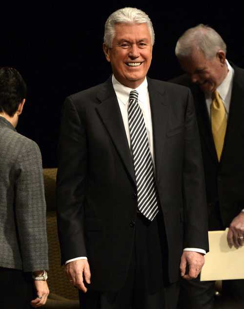 Rick Egan | The Salt Lake Tribune

President Dieter F. Uchtdorf, second counselor in the LDS Church's governing First Presidency, acknowledges the crowd, before giving the keynote address to the "Church History Symposium." at the LDS Conference Center Theater, Friday, March 7, 2014