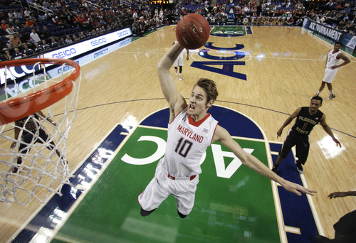 Maryland's Jake Layman (10) goes up to dunk against Florida State during the first half of an NCAA college basketball game in the second round of the Atlantic Coast Conference tournament in Greensboro, N.C., Thursday, March 13, 2014. (AP Photo/Bob Leverone)