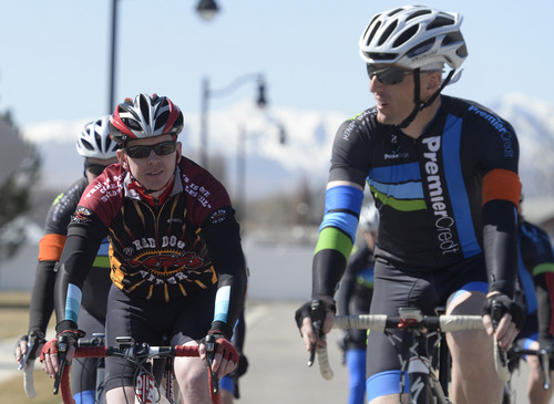 Rick Egan  | The Salt Lake Tribune 

Rand Blair (left) and Sean Jager (right) were part of a group of  cyclists that gathered for a memorial ride for Bryan Byrge and John Coons, in South Jordan, Friday, March 14, 2014.