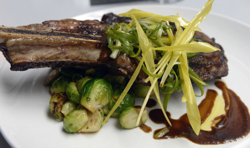Al Hartmann  |  The Salt Lake Tribune 
T-Bone steak with brussel sprouts at Bistro 222.