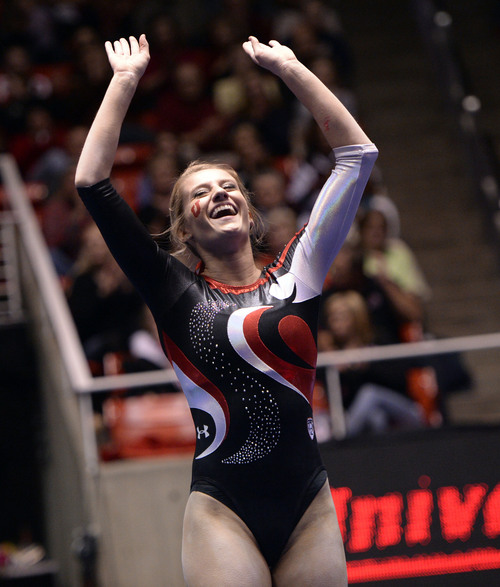 Al Hartmann  |  The Salt Lake Tribune 
University of Utah's Mary Beth Lofgren raises her arms in triumph at the end of her floor excercise during gymnastics meet against the University of Washington at the Huntsman Center Friday February 28.