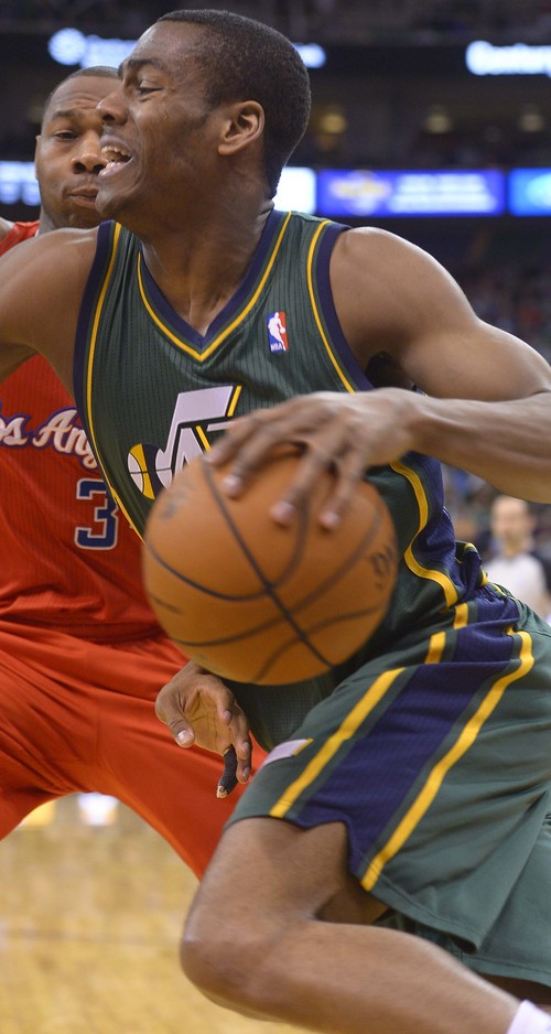Leah Hogsten  |  The Salt Lake Tribune
Utah Jazz guard Alec Burks (10) fights Los Angeles Clippers guard Chris Paul (3) to the net. Los Angeles Clippers  defeated the Utah Jazz 96-87, Friday, March, 14, 2014 at Energy Solutions Arena.