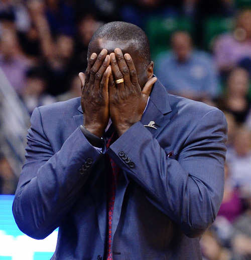Steve Griffin  |  The Salt Lake Tribune


Utah Jazz head coach Tyrone Corbin holds his face in his hands after a call was called during first half action in the Jazz versus Mavericks game at EnergySolutions Arena in Salt Lake City, Utah Wednesday, March 12, 2014.