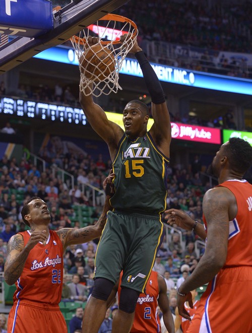 Leah Hogsten  |  The Salt Lake Tribune
Utah Jazz center Derrick Favors (15) with the dunk over the Los Angeles Clippers during the first half of their game, Friday, March, 14, 2014 at Energy Solutions Arena.