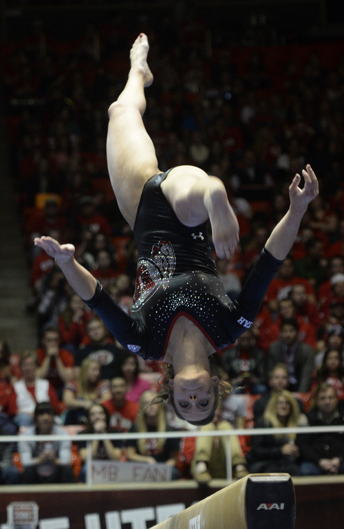 Rick Egan  | The Salt Lake Tribune 

Breanna Hughes on the beam for the Utes, in gymnastics action, Utah vs. Georgia, Saturday, March 15, 2014.