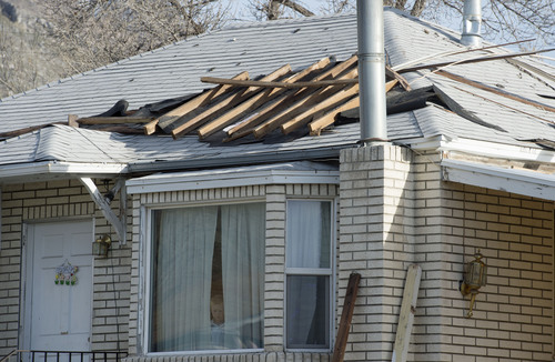 Steve Griffin  |  The Salt Lake Tribune


Parts of the roof came to rest on neighboring homes after a house at 1214 E. 520 South in Provo, Utah exploded and burned Sunday, March 16, 2014.