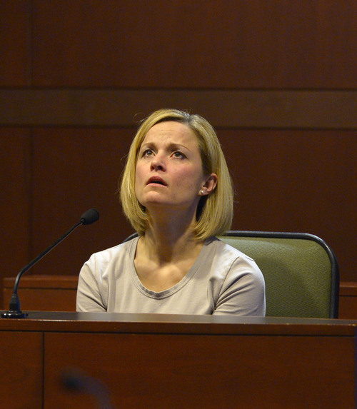 Leah Hogsten  |  The Salt Lake Tribune
Dea Millerberg testifies against her husband, Eric Millerberg, Wednesday, February 12, 2014 in 2nd District Court. Eric Millerberg is accused in the 2011 drug-related death of his children's 16-year-old baby sitter.