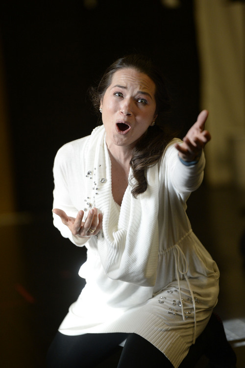 Francisco Kjolseth  |  The Salt Lake Tribune
Kelly Kaduce rehearses a scene where her character, Li˘, is tortured as Utah Opera presents "Turandot," Puccini's opera about the princess who decapitates several suitors while waiting for the right man to come along.