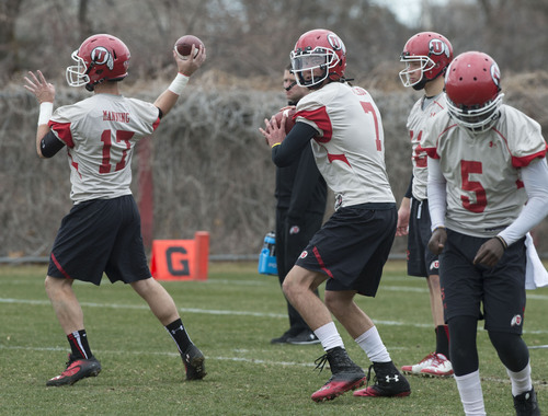 Steve Griffin  |  The Salt Lake Tribune

The University of Utah quarterbacks, lead by Travis Wilson, #7, center, throw downfield during spring practice on the University of Utah campus in Salt Lake City, Utah Tuesday, March 18, 2014.