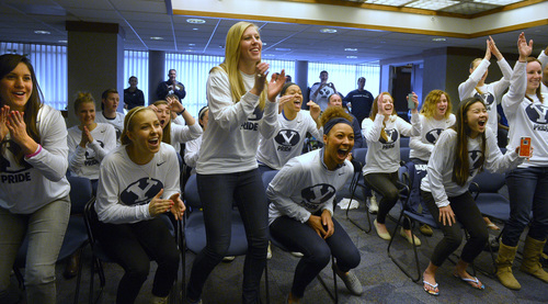 Rick Egan  | The Salt Lake Tribune 

The BYU women's basketball team celebrates as their name is announced as they watch the NCAA Selection Show in the Cougar Room at the Marriott Center, Monday, March 17, 2014. The Cougars will meet North Carolina State in the first round.