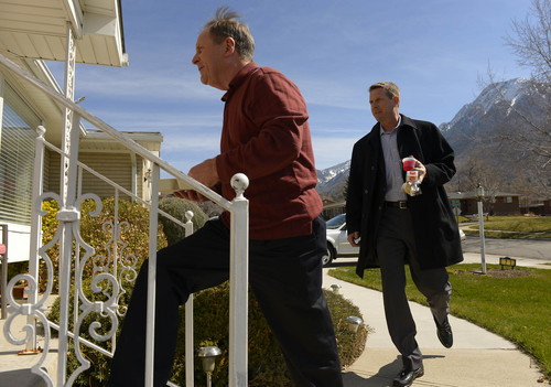 Leah Hogsten  |  The Salt Lake Tribune
Holladay mayor Robert M. Dahle (right) delivers Meals on Wheels with the help of deliveryman Mark Eggen, Wednesday, March, 19, 2014 in Holladay.  City mayors from across Salt Lake County showed their support for our community's homebound seniors by participating in Meals on Wheels deliveries.