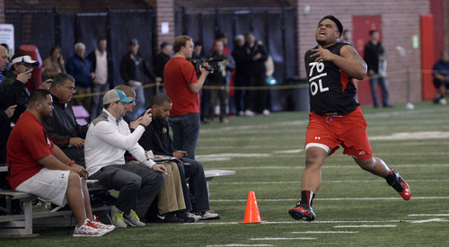 Al Hartmann  |  The Salt Lake Tribune
Ute offensive lineman Jeremiah Tofaeono sprints a 40 yard dash during the NFL Pro Day at the Spence Eccles Field House Wednesday March 19.  Utah players did a variety of strength, agility, and speed drills to make an impression for NFL scouts.