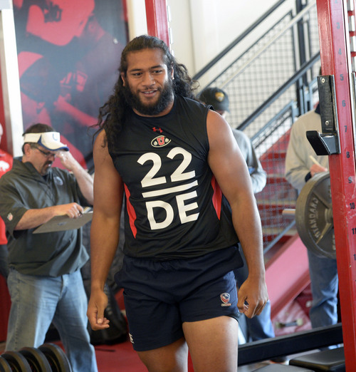 Al Hartmann  |  The Salt Lake Tribune
Ute defensive end Thretton Palamo smiles after lifting 235 pounds on  the bench press during the NFL Pro Day at the Spence Eccles Field House Wednesday March 19. 	Utah players did a variety of strength, agility, and speed drills to make an impression for NFL scouts.