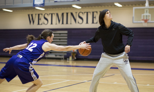 Lennie Mahler  |  The Salt Lake Tribune
Westminster guard Katie Richens knocks the ball away from head coach Shelley Jarrard in a practice drill in the Eccles Athletic Center on campus Friday, March 14, 2014. The team will enter the NAIA Tournament as a No. 1 seed next week.