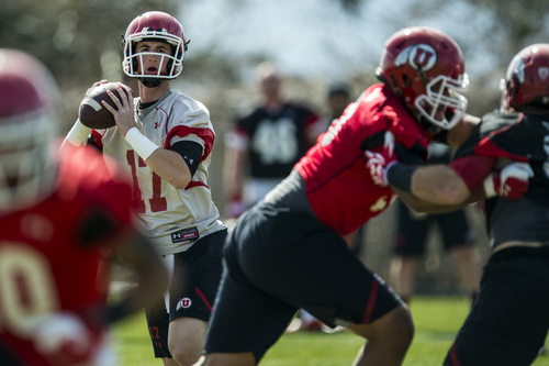 Chris Detrick  |  The Salt Lake Tribune
Utah quarterback Conner Manning looks to pass the ball during a practice at Spence and Cleone Eccles Football Center Thursday March 20, 2014.