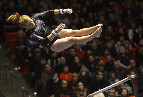 Rick Egan  | The Salt Lake Tribune 

Tory Wilson competes on the bars for the Utes, in Pac12 gymnastics competition, Utah vs. UCLA, at the Huntsman Center, Saturday, January 25, 2014.