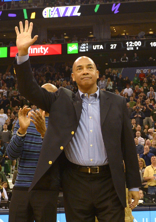 Rick Egan  | The Salt Lake Tribune 

Jerry Eaves former Utah Jazz player from the1983-84 team, waves to the crowd, during a break in the action, during the Utah Jazz, Orlando Magic game, at EnergySolutions Arena Saturday, March 22, 2014.