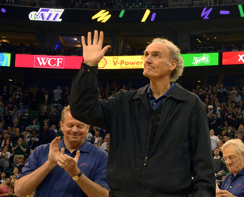 Rick Egan  | The Salt Lake Tribune 

 Rick Kelley, former Utah Jazz player from the1983-84 team, waves to the crowd, during a break in the action, during the Utah Jazz, Orlando Magic game, at EnergySolutions Arena Saturday, March 22, 2014.