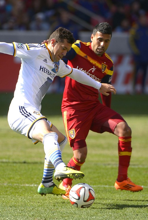 Leah Hogsten  |  The Salt Lake Tribune
Los Angeles Galaxy defender Dan Gargan (33) battles Real Salt Lake midfielder Javier Morales (11).  Real Salt Lake and the L.A. Galaxy's game ended in a 1-1 draw Saturday, March 22, 2014 during RSL's home opener at Rio Tinto Stadium.